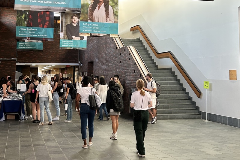 students walking in the Toronto campus lobby